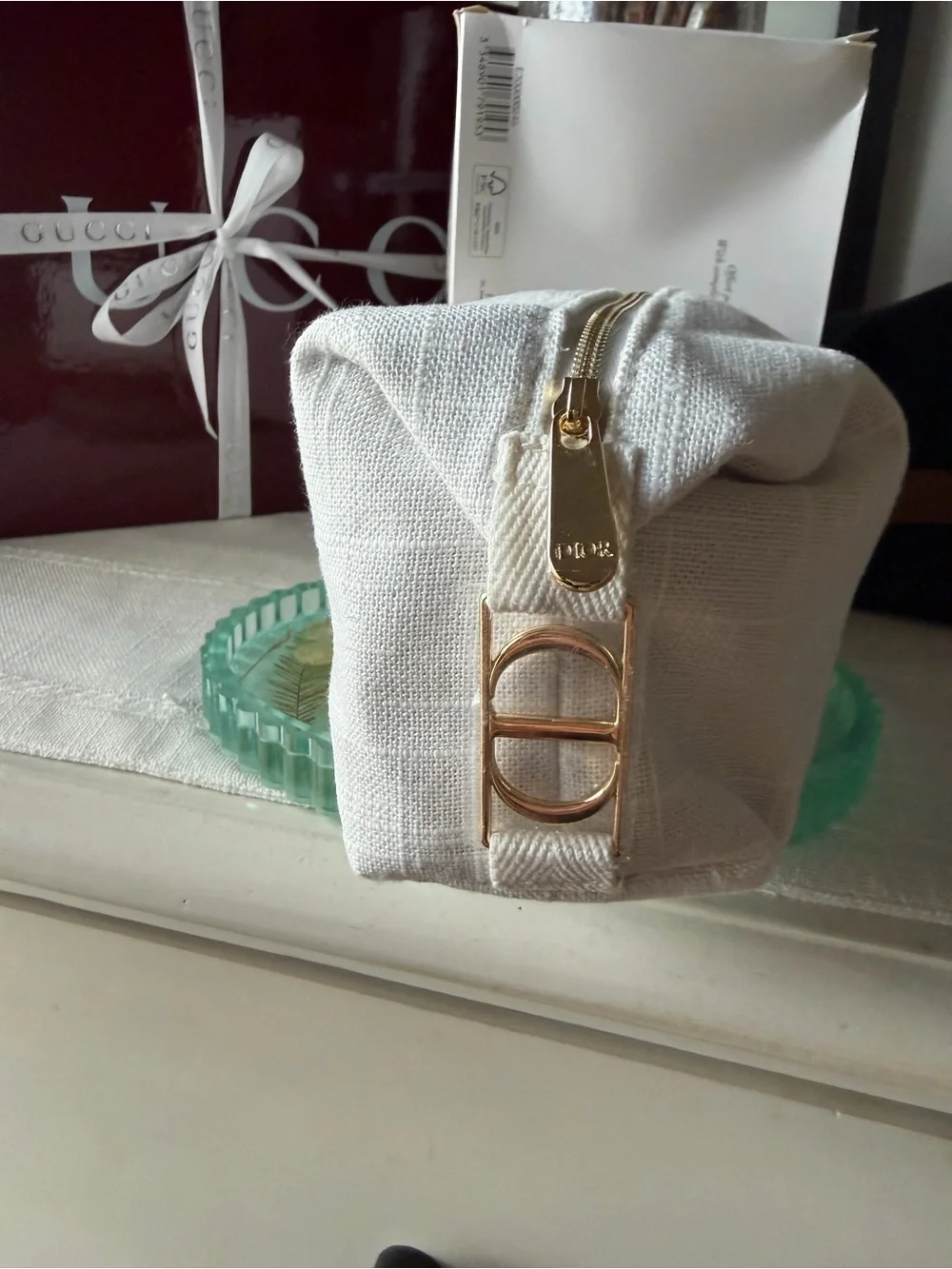Dior Off-White Embossed Canvas Pouch with Gold Accents